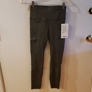 Lululemon Fast & free HR 25" tight sz 4 olive gre